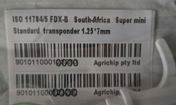 Picture of Microchip rfid fdx-b Pet SUPER Mini 1.25mm x 7mm including a pet record card.